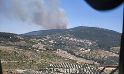 Manisa'nın Soma ilçesinde çıkan orman yangınına müdahale ediliyor