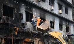 Death toll climbs to 14 in Pakistan shopping center fire, dozens missing