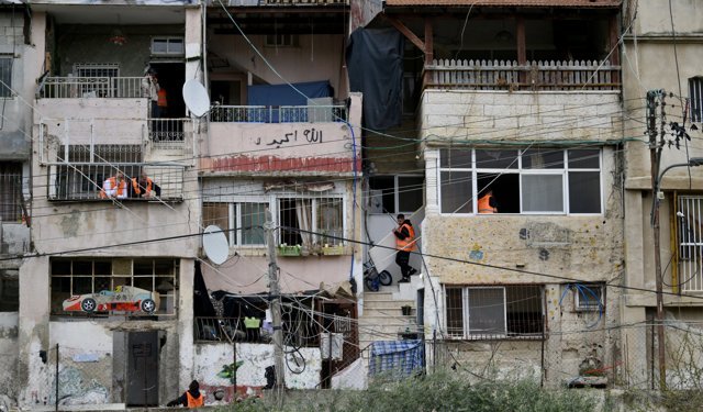 Filistin topraklarını gasbeden İsrailliler, işgal altındaki Doğu Kudüs'te 13 daireye el koydu