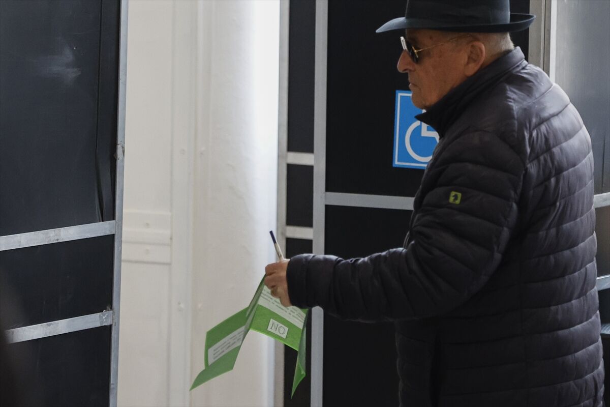 CORRECTS - Italians head to polls to vote on judicial reform